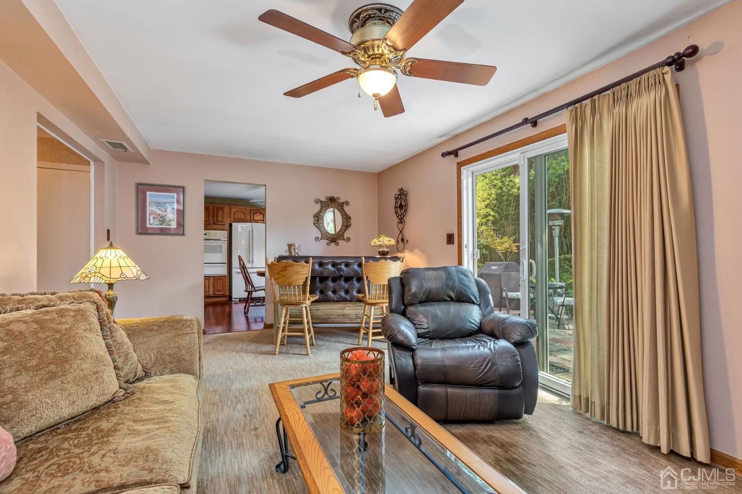 29 Hunt Road Somerset, NJ 08873 - Photo 17 of 41 a living room with furniture and a window