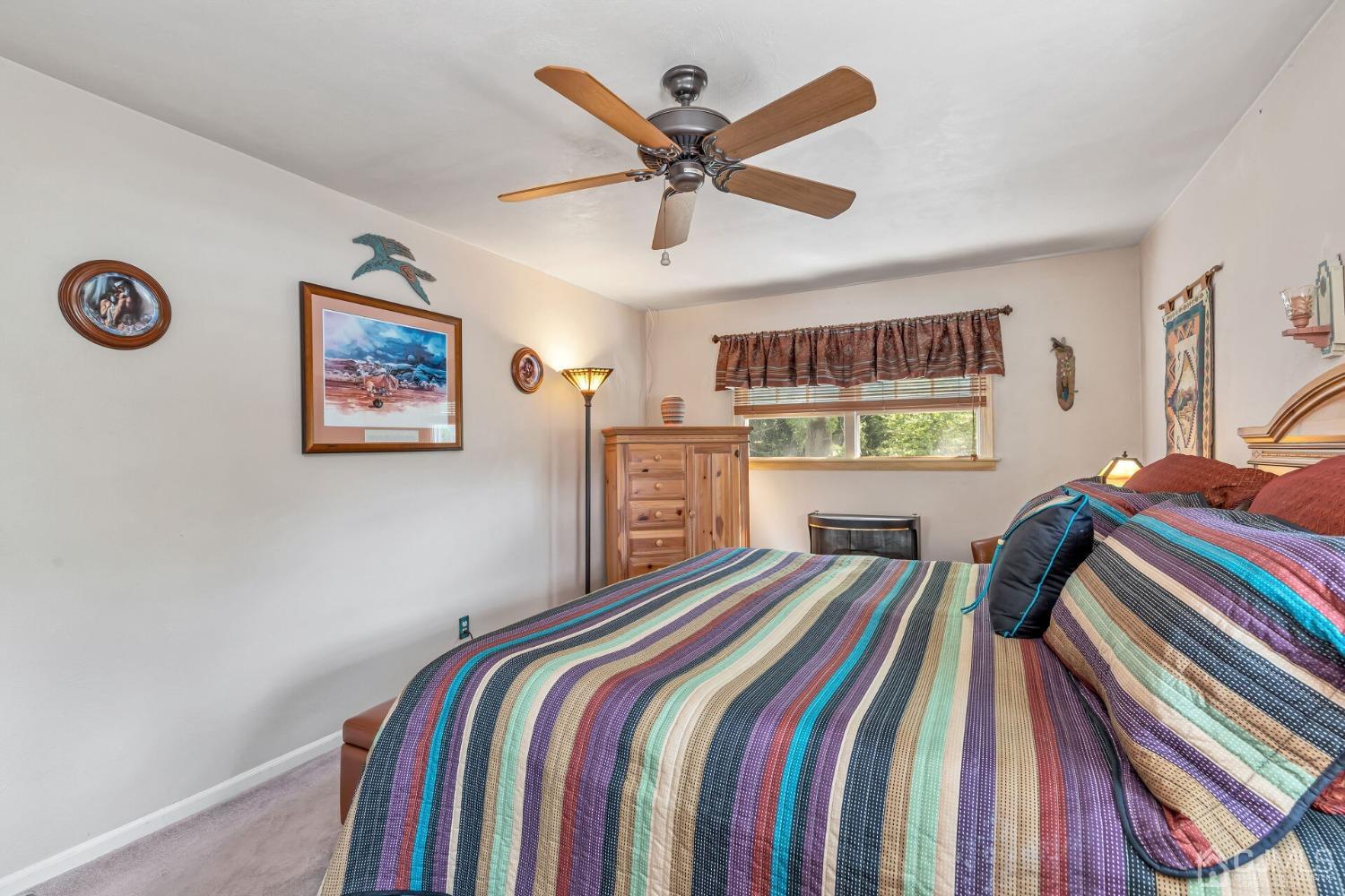 29 Hunt Road Somerset, NJ 08873 - Photo 18 of 41 a bedroom with a bed and a chandelier