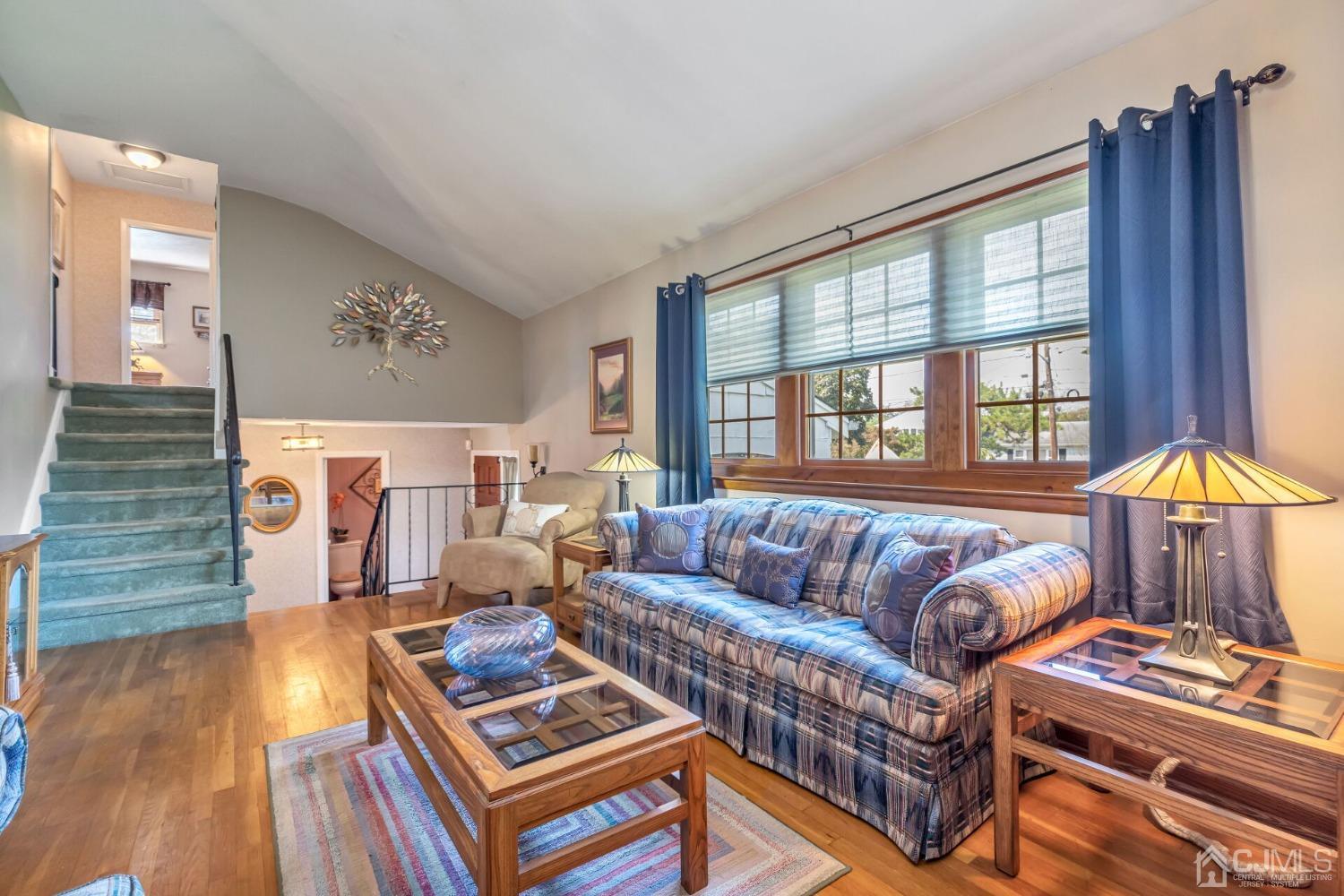 29 Hunt Road Somerset, NJ 08873 - Photo 6 of 41 a living room with furniture and a window