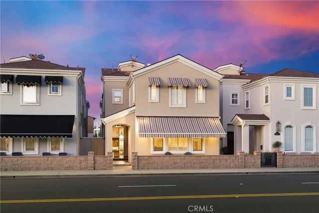 a front view of a house with a ocean view