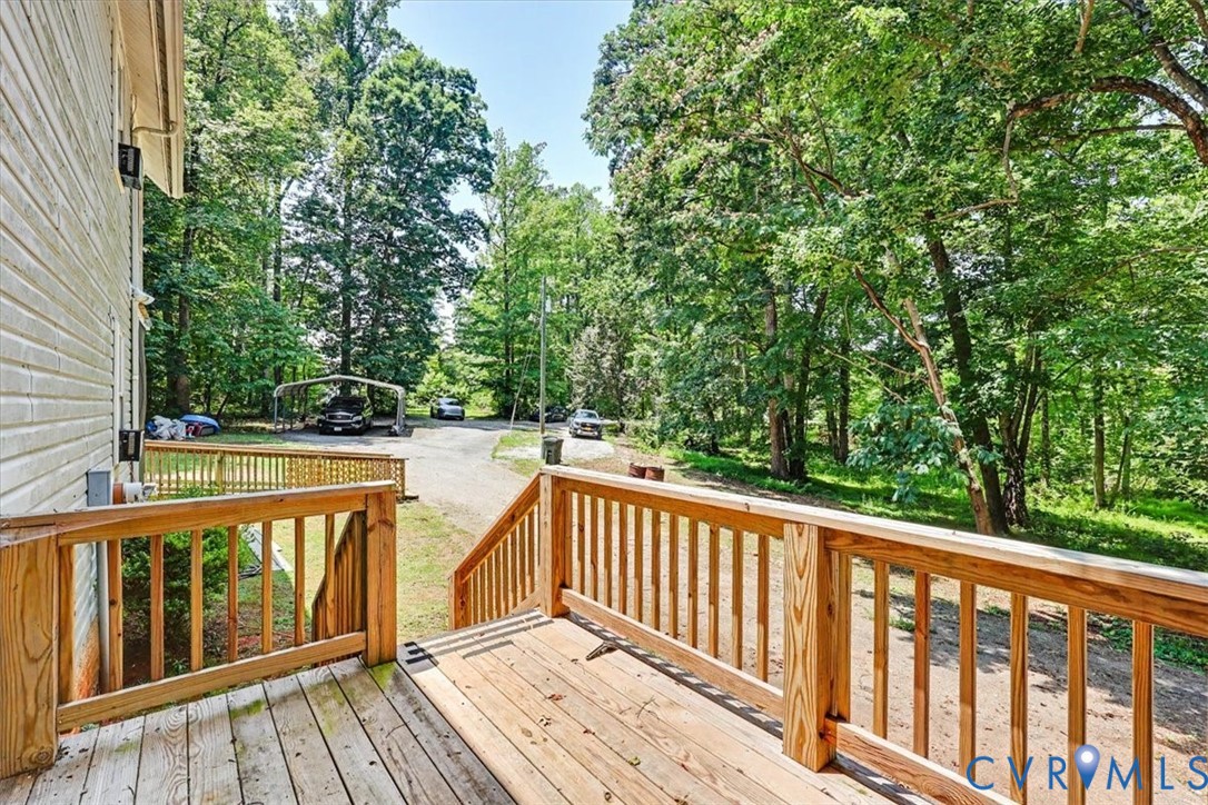 62 The Fls Road Victoria, VA 23974 - Photo 28 of 36 Wood deck with natural wood railing overlooking a