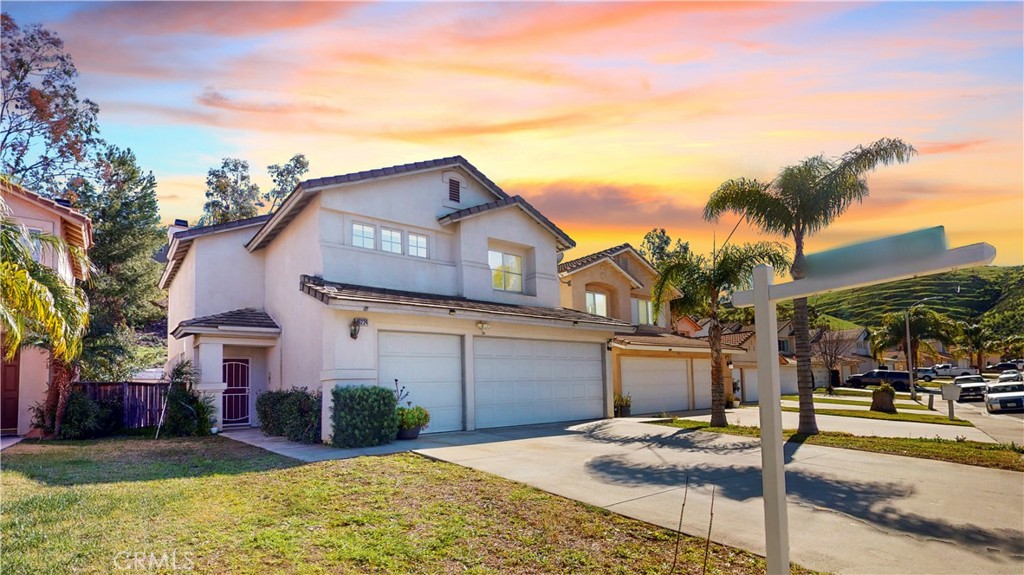 16224 Twilight Circle Riverside, CA 92503 - Photo 1 of 1 a front view of a house with a yard and garage
