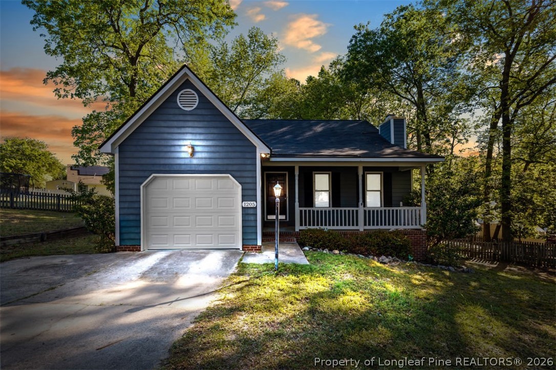 1205 Crossbend Court Fayetteville, NC 28314 - Photo 1 of 37 a front view of a house with a yard