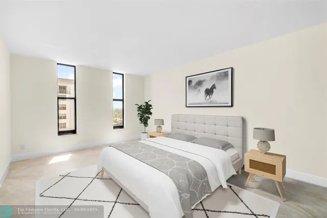 a bathroom with a double vanity sink mirror and double