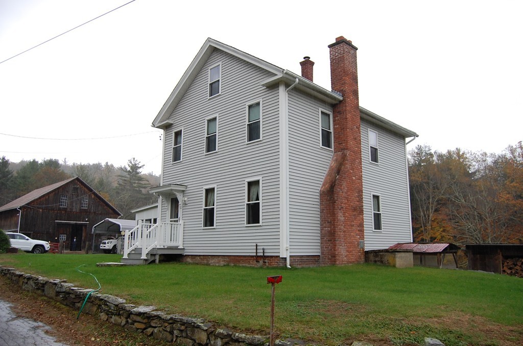 5 Knox Trail Road Warren, MA 01083 - Photo 1 of 28 a view of a house with a yard