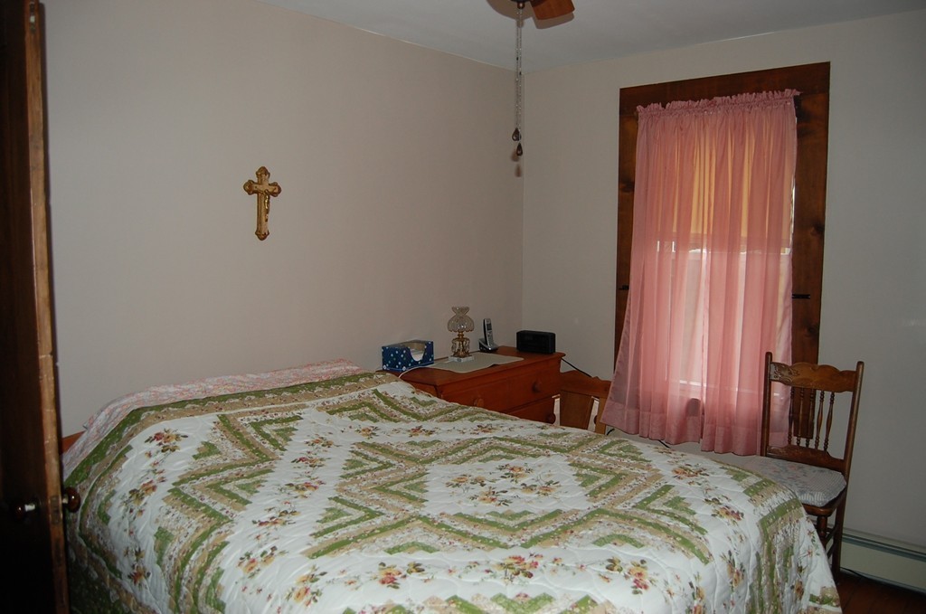 5 Knox Trail Road Warren, MA 01083 - Photo 12 of 28 a bedroom with a bed and a window