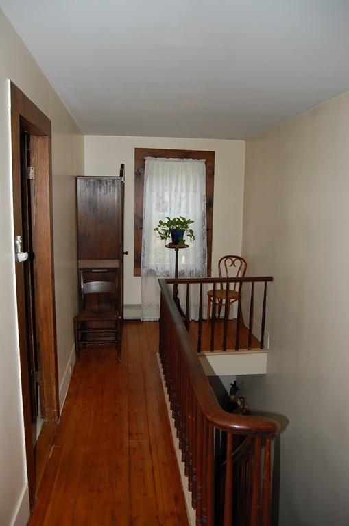 5 Knox Trail Road Warren, MA 01083 - Photo 16 of 28 a view of hallway with wooden floor