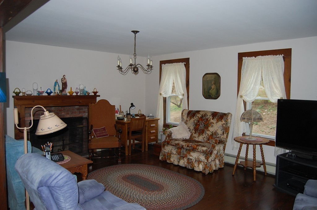 5 Knox Trail Road Warren, MA 01083 - Photo 6 of 28 a living room with furniture and a flat screen tv