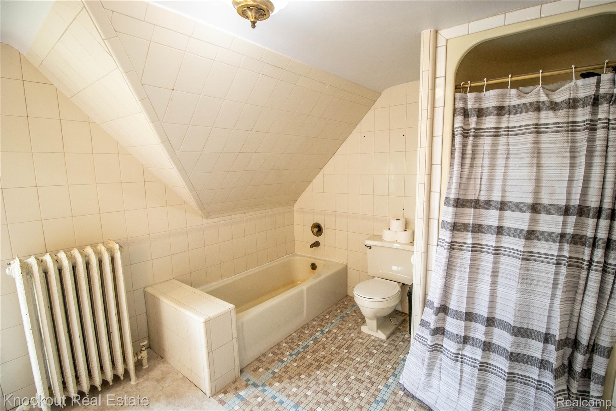 19983 West Ridge Road Henderson, MI 48841 - Photo 54 of 76 Bathroom featuring a built-in bathtub, a toilet, and a separate shower enclosure
