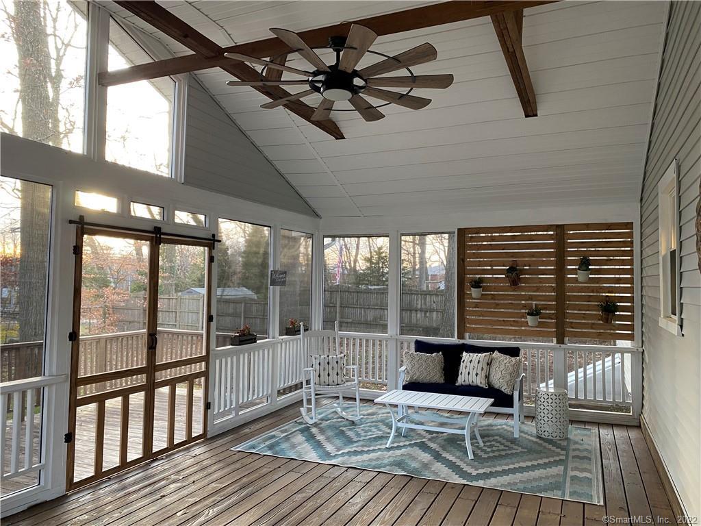 164 Robin Hill Road where you will live from spring till fall on your new covered screened in porch with custom fan!!