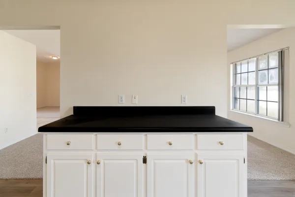 a view of kitchen cabinets