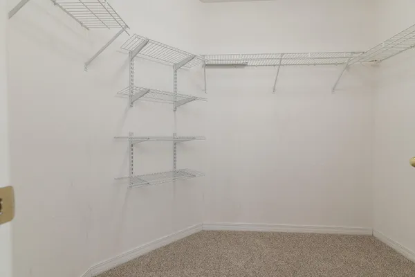 a view of a room with racks on the wall