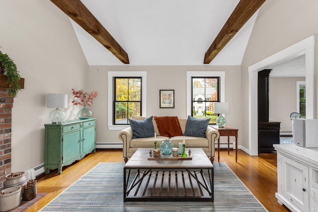 8 Bubbling Brook Road Franklin, MA 02038 - Photo 15 of 46 a living room with furniture and a wooden floor