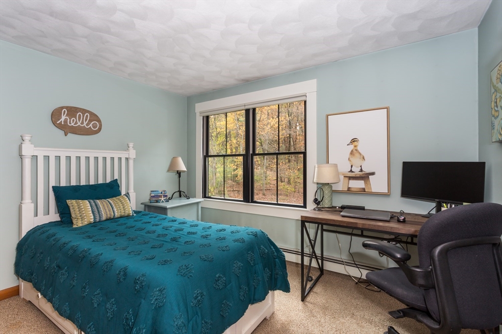 8 Bubbling Brook Road Franklin, MA 02038 - Photo 30 of 46 a bedroom with a bed and a window