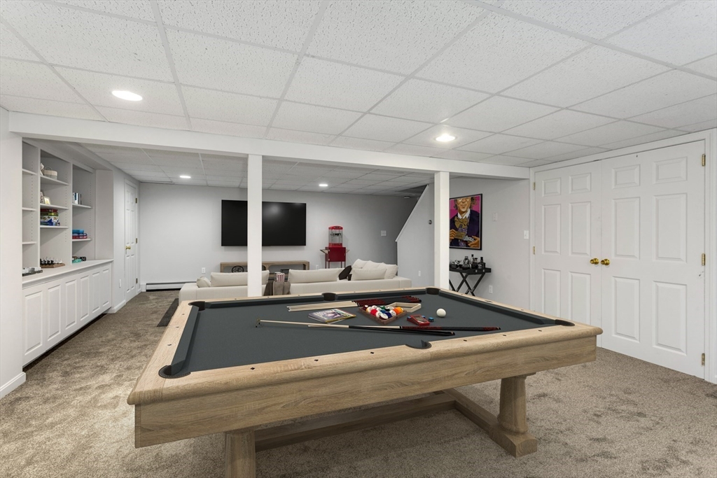 8 Bubbling Brook Road Franklin, MA 02038 - Photo 31 of 46 a room with furniture pool table and flat screen tv