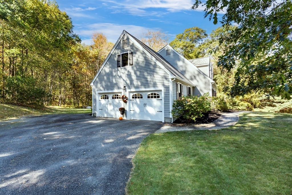 8 Bubbling Brook Road Franklin, MA 02038 - Photo 40 of 46 a view of a house with a yard