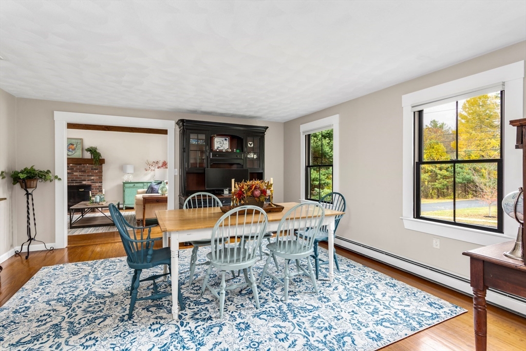 8 Bubbling Brook Road Franklin, MA 02038 - Photo 4 of 46 a view of a dining room with furniture window and wooden floor