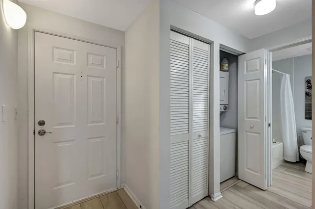a view of a bathroom with closet area