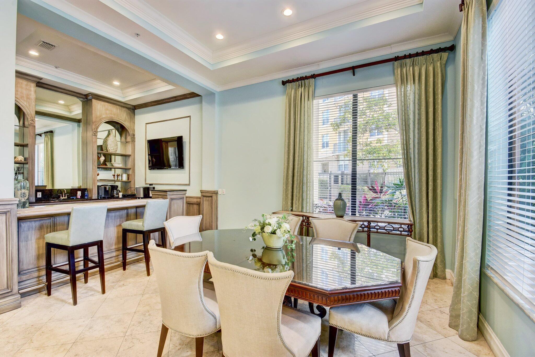 630 South Sapodilla Avenue, Unit 223 West Palm Beach, FL 33401 - Photo 37 of 43 a view of a dining room with furniture window and outside view