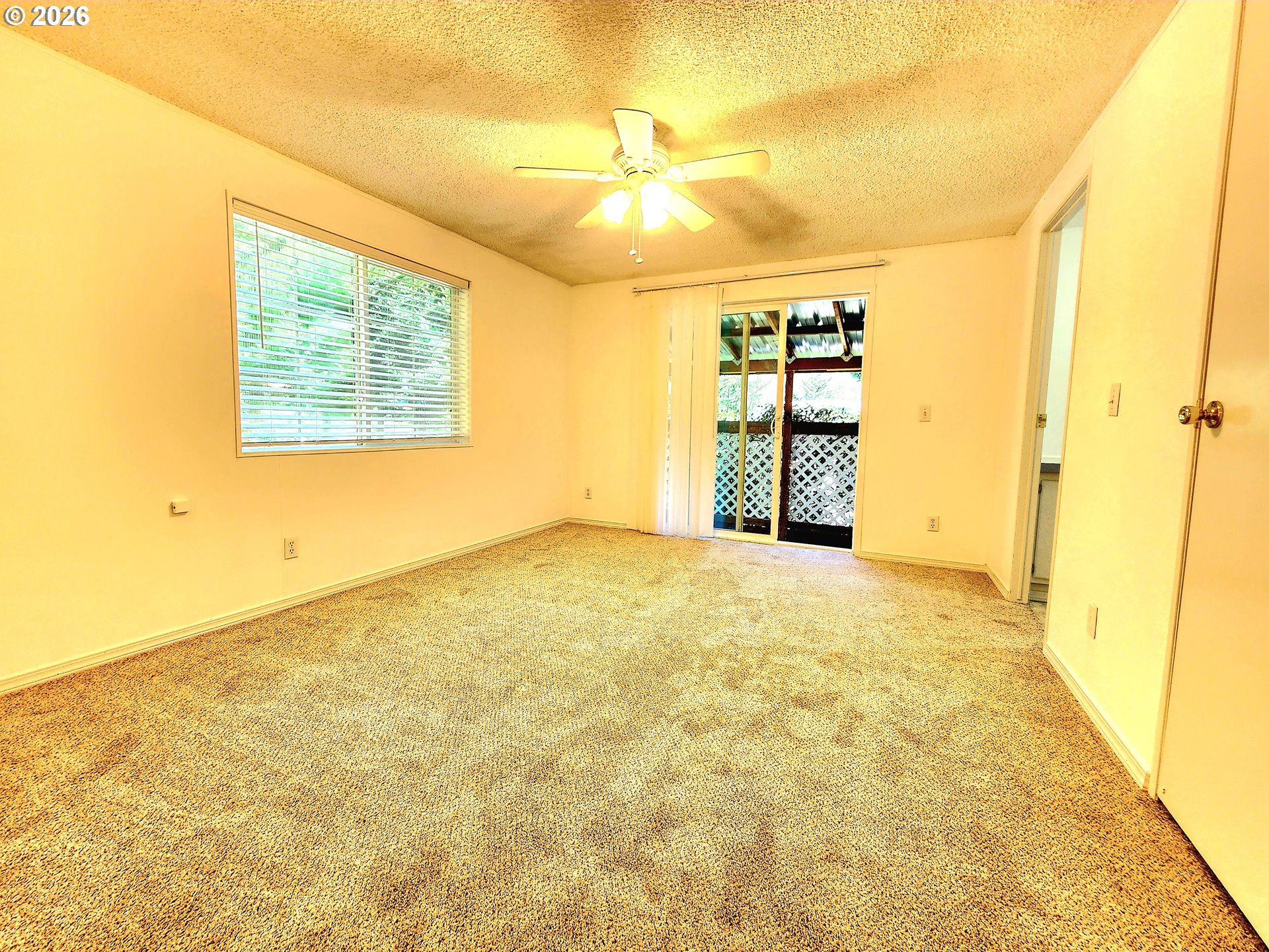 874 South Main Street Canyonville, OR 97417 - Photo 11 of 30 a view of an empty room with a window