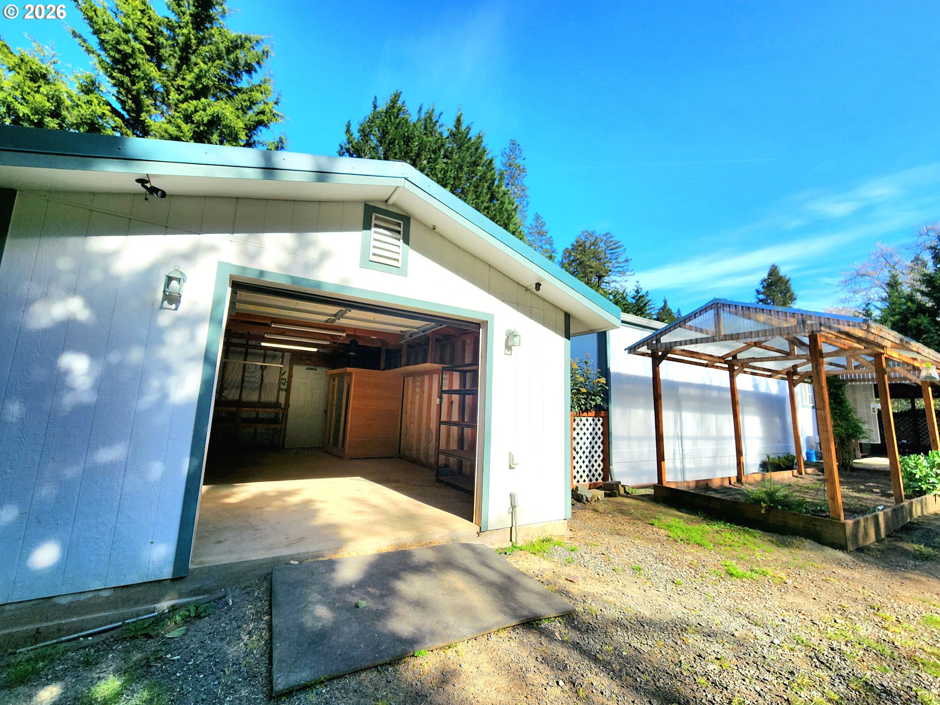 874 South Main Street Canyonville, OR 97417 - Photo 23 of 30 a view of a house with a yard