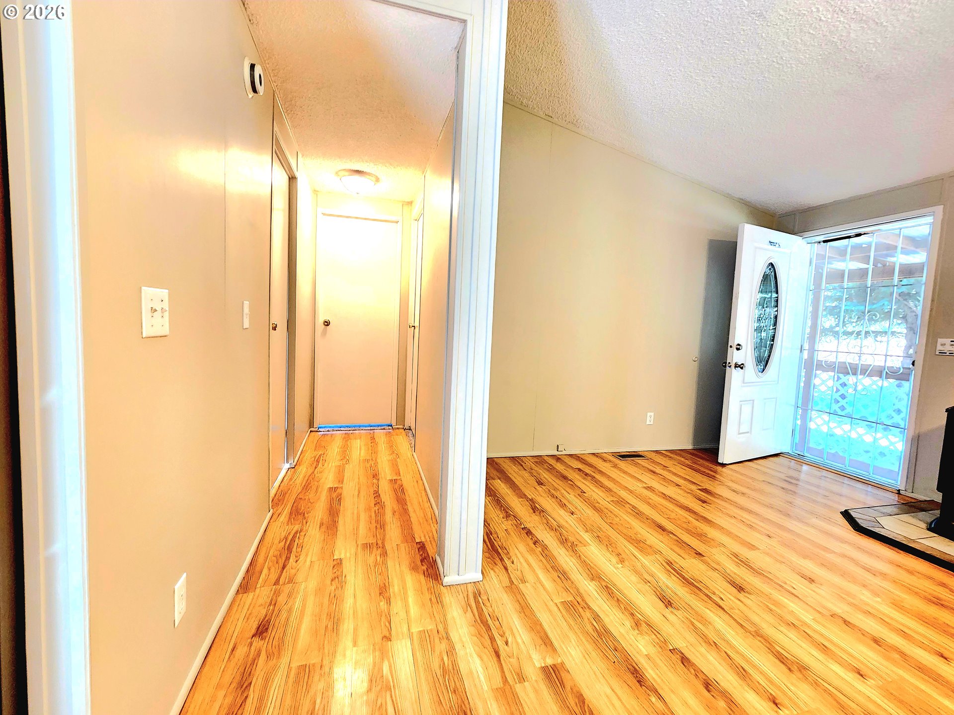 874 South Main Street Canyonville, OR 97417 - Photo 4 of 30 a view of a bedroom with wooden floor and bedroom