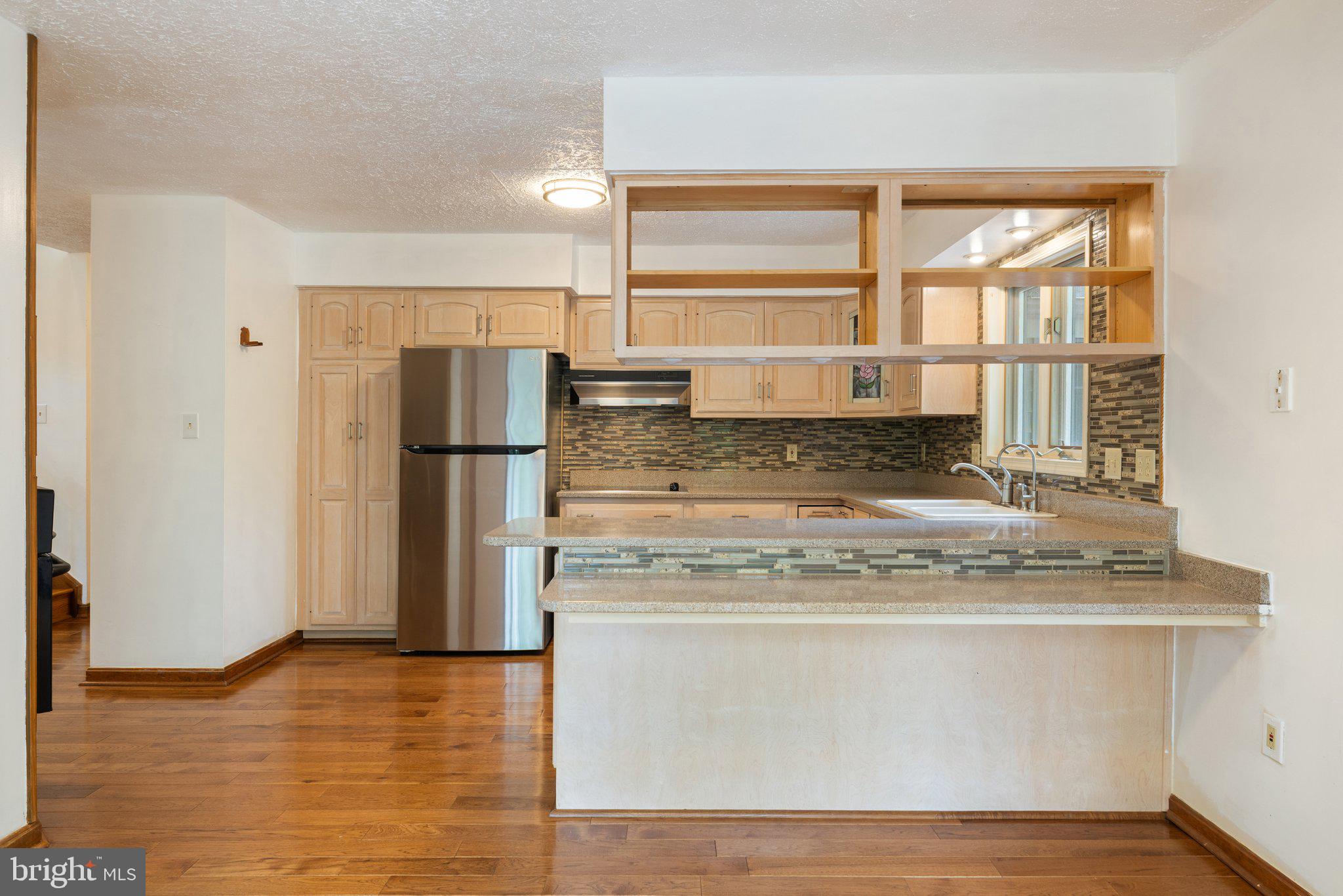 155 Connie Road Basye, VA 22810 - Photo 23 of 76 a kitchen with stainless steel appliances granite countertop a refrigerator and a stove