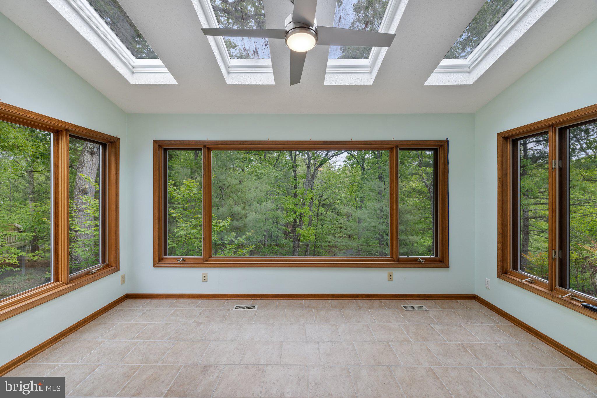 155 Connie Road Basye, VA 22810 - Photo 27 of 76 a view of an empty room with windows