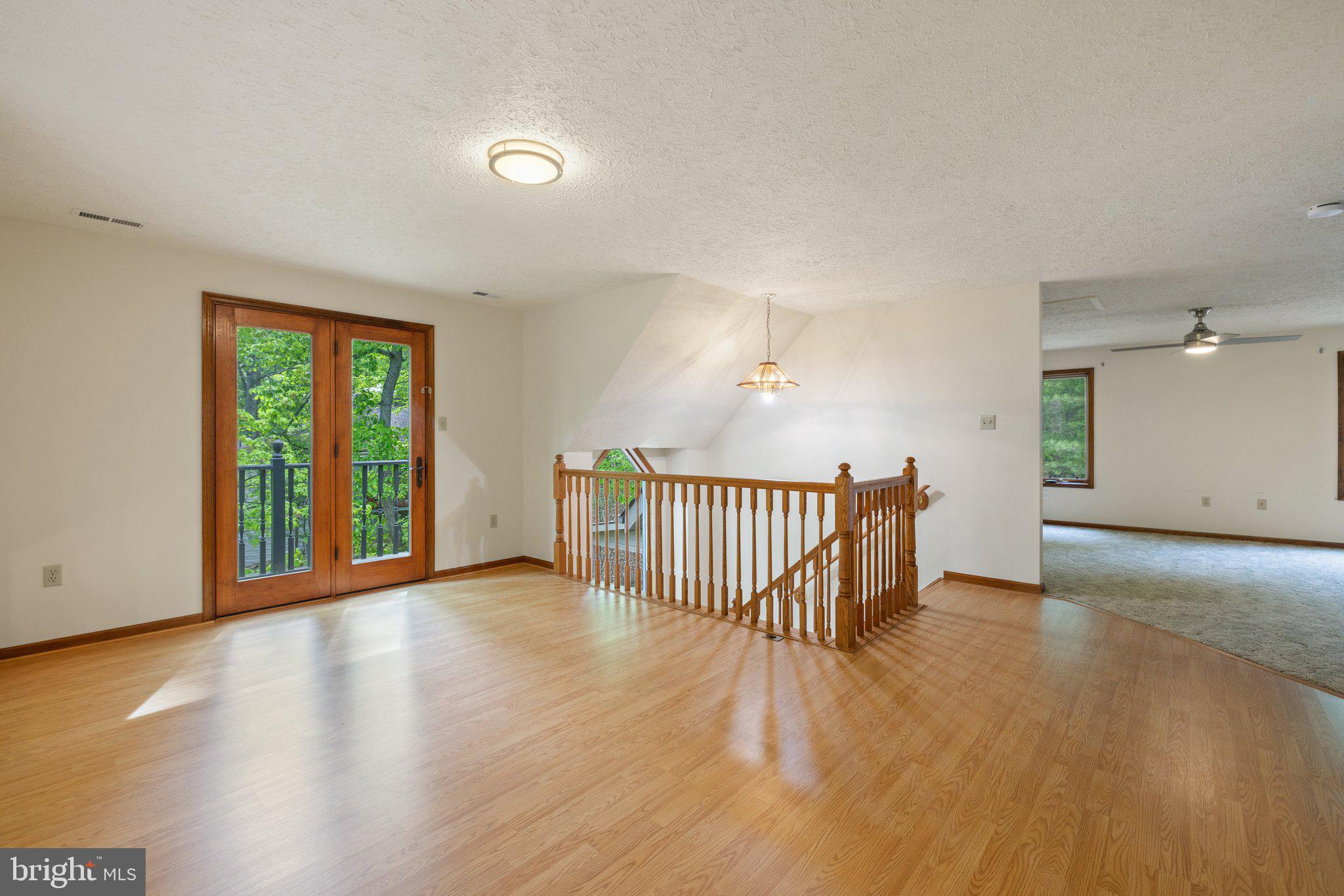 155 Connie Road Basye, VA 22810 - Photo 35 of 76 a view of a room with wooden floor and a window