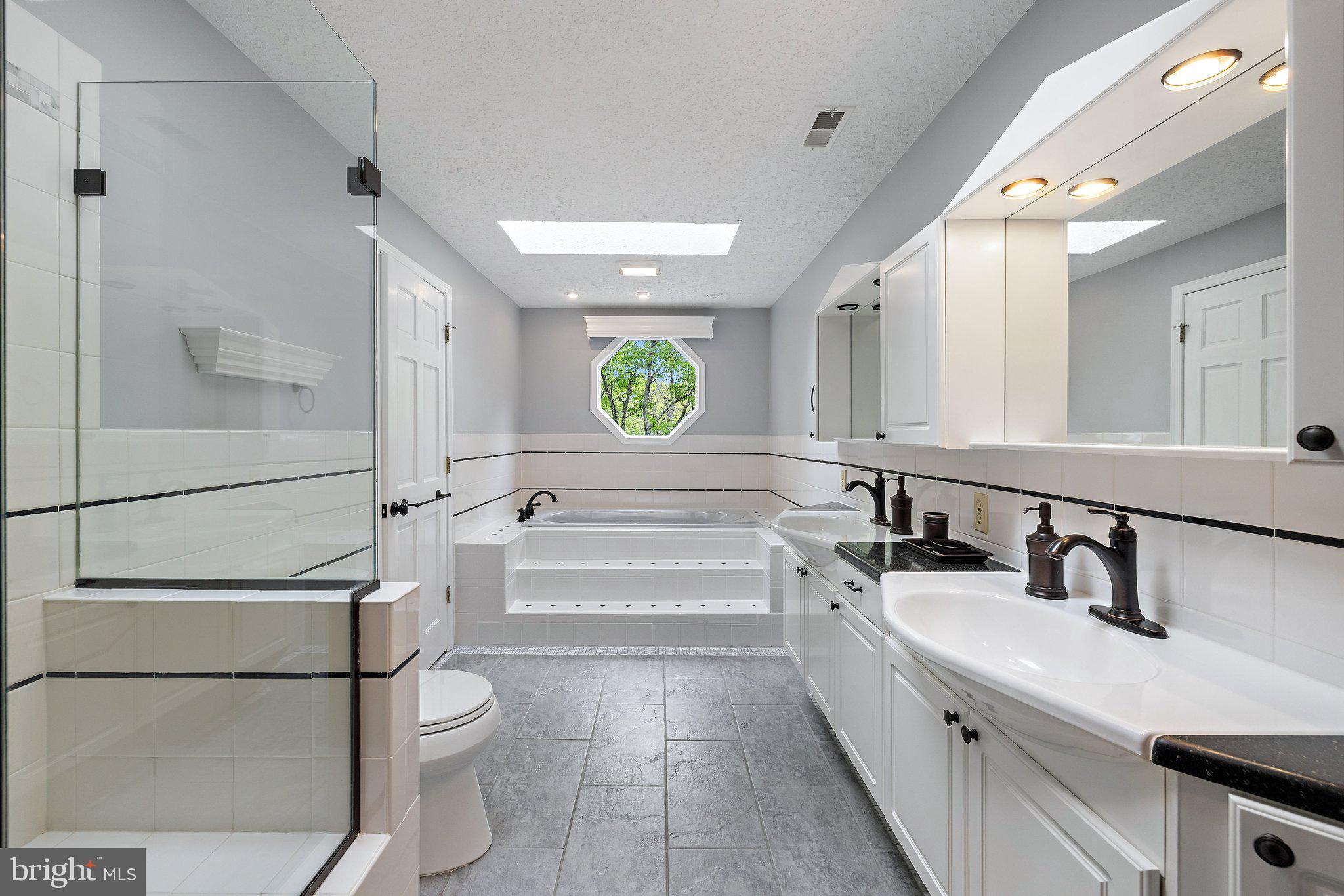 155 Connie Road Basye, VA 22810 - Photo 4 of 76 Gorgeous updated primary bathroom with storage!