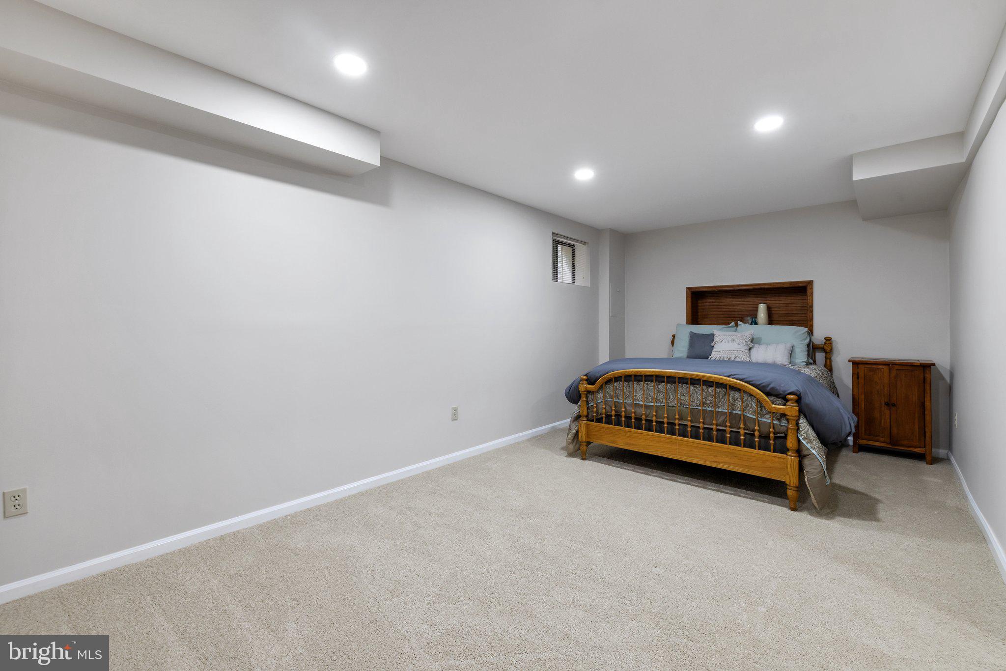 155 Connie Road Basye, VA 22810 - Photo 51 of 76 a bedroom with a bed and a view of livingroom