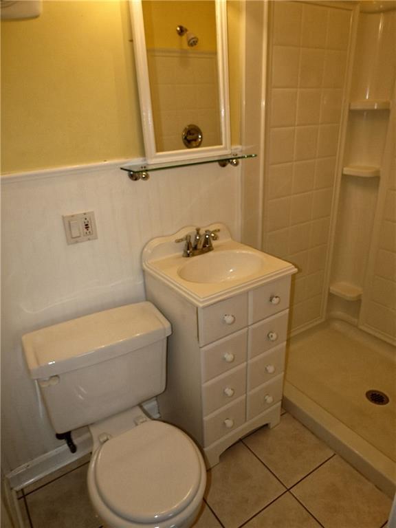 670 Meadow Lane Rochester, PA 15074 - Photo 11 of 21 Master bath is updated with new fixtures, ceramic tile floors and cottage style wainscoting.