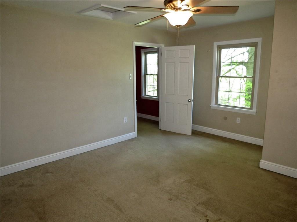 670 Meadow Lane Rochester, PA 15074 - Photo 12 of 21 This 15X12 den (or 4th bedroom if desired) includes a closet & ceiling fan and is located off of the master bedroom.