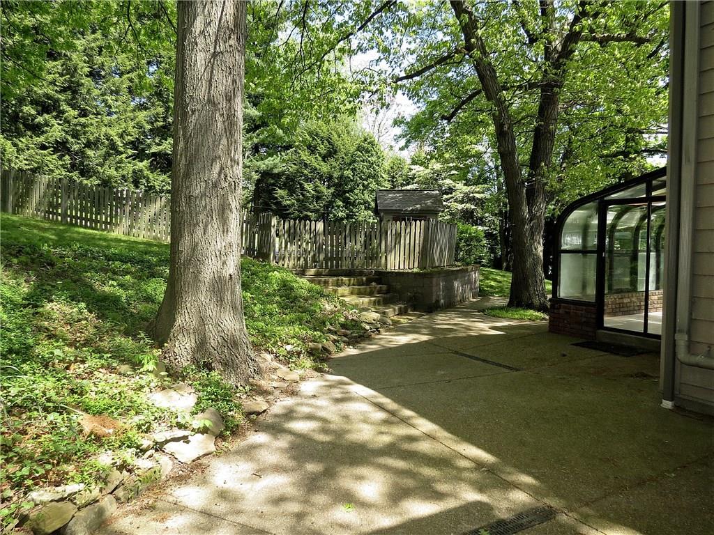 670 Meadow Lane Rochester, PA 15074 - Photo 17 of 21 The cement patio was installed in 2005 - a stone wall partially surrounding the in ground pool was professionally added in 2006.