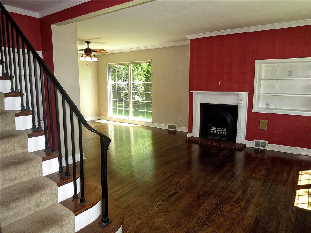 The 25X12 expansive living room is large enough for a grand piano & over stuffed furniture.
