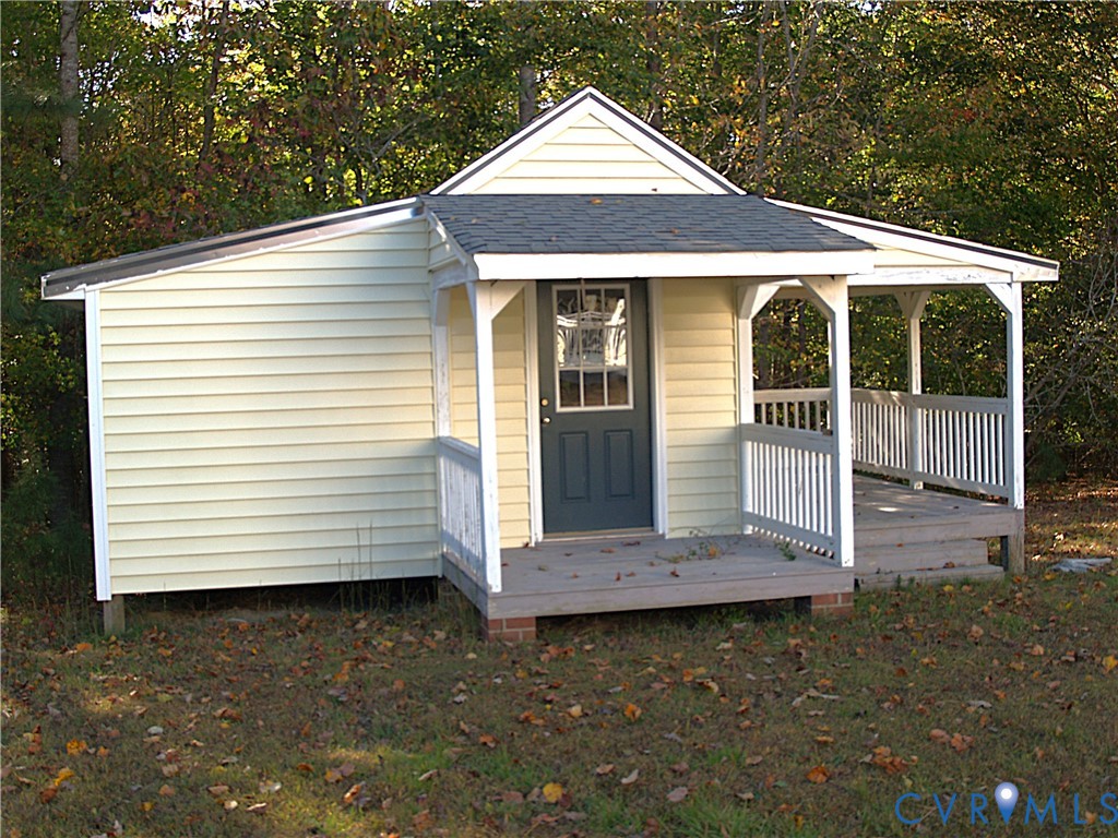 11950 Union Camp Road New Kent, VA 23124 - Photo 20 of 20 a front view of a house with a yard