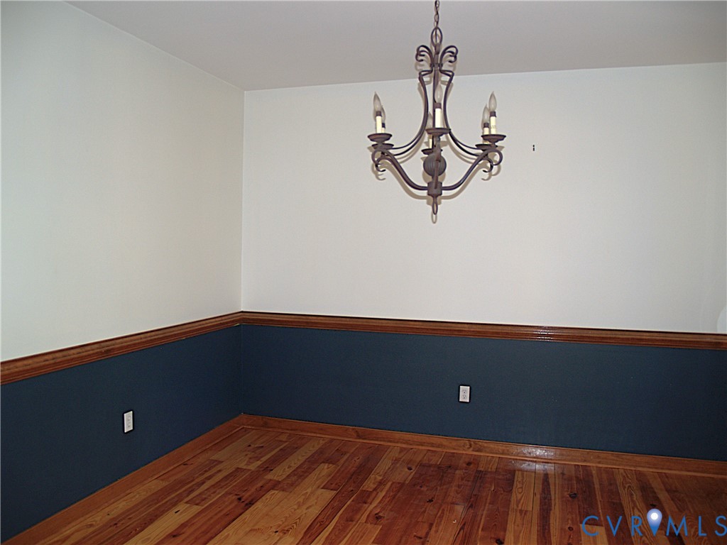 11950 Union Camp Road New Kent, VA 23124 - Photo 3 of 20 a view of a room with rack on the wall