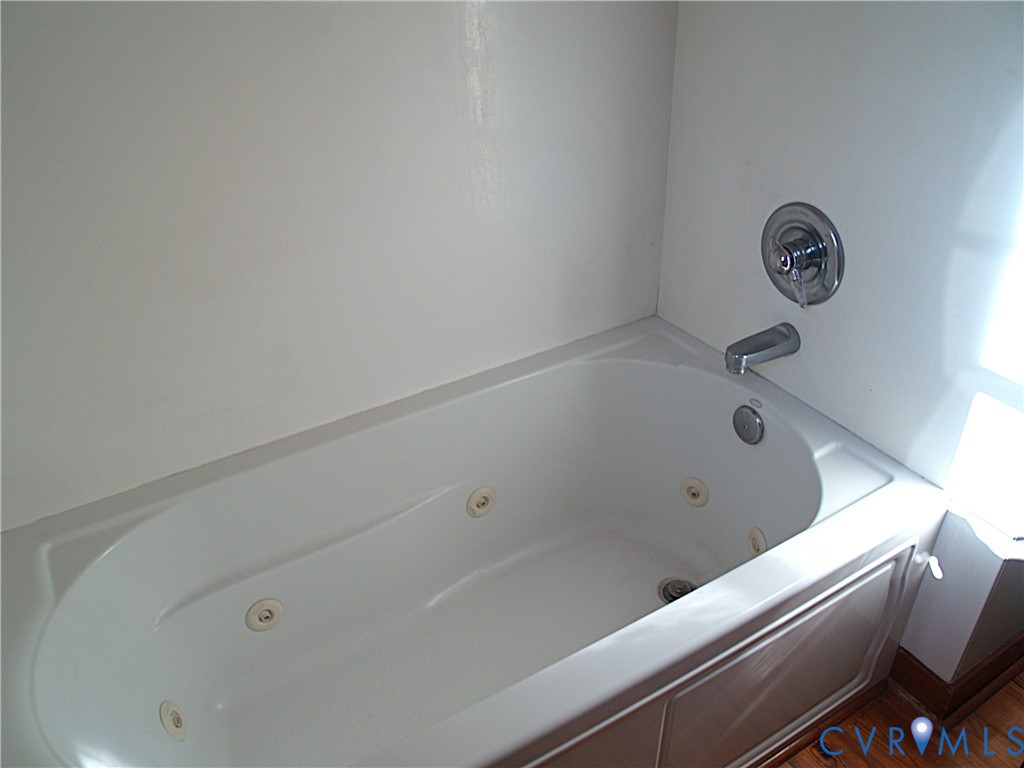 11950 Union Camp Road New Kent, VA 23124 - Photo 8 of 20 a bathroom with a bathtub
