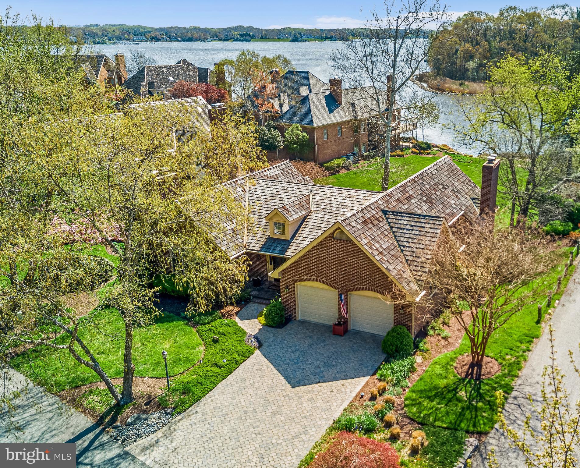 970 South River Landing Road Edgewater, MD 21037 - Photo 1 of 44 an aerial view of a house with a yard and large trees