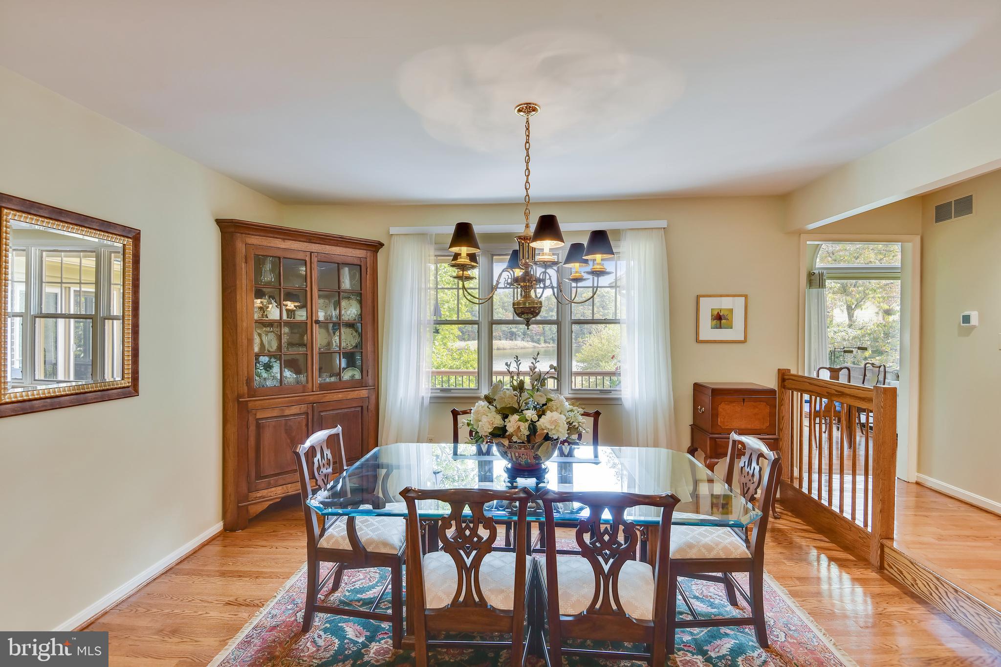 970 South River Landing Road Edgewater, MD 21037 - Photo 12 of 44 a view of a dining room with furniture window and wooden floor