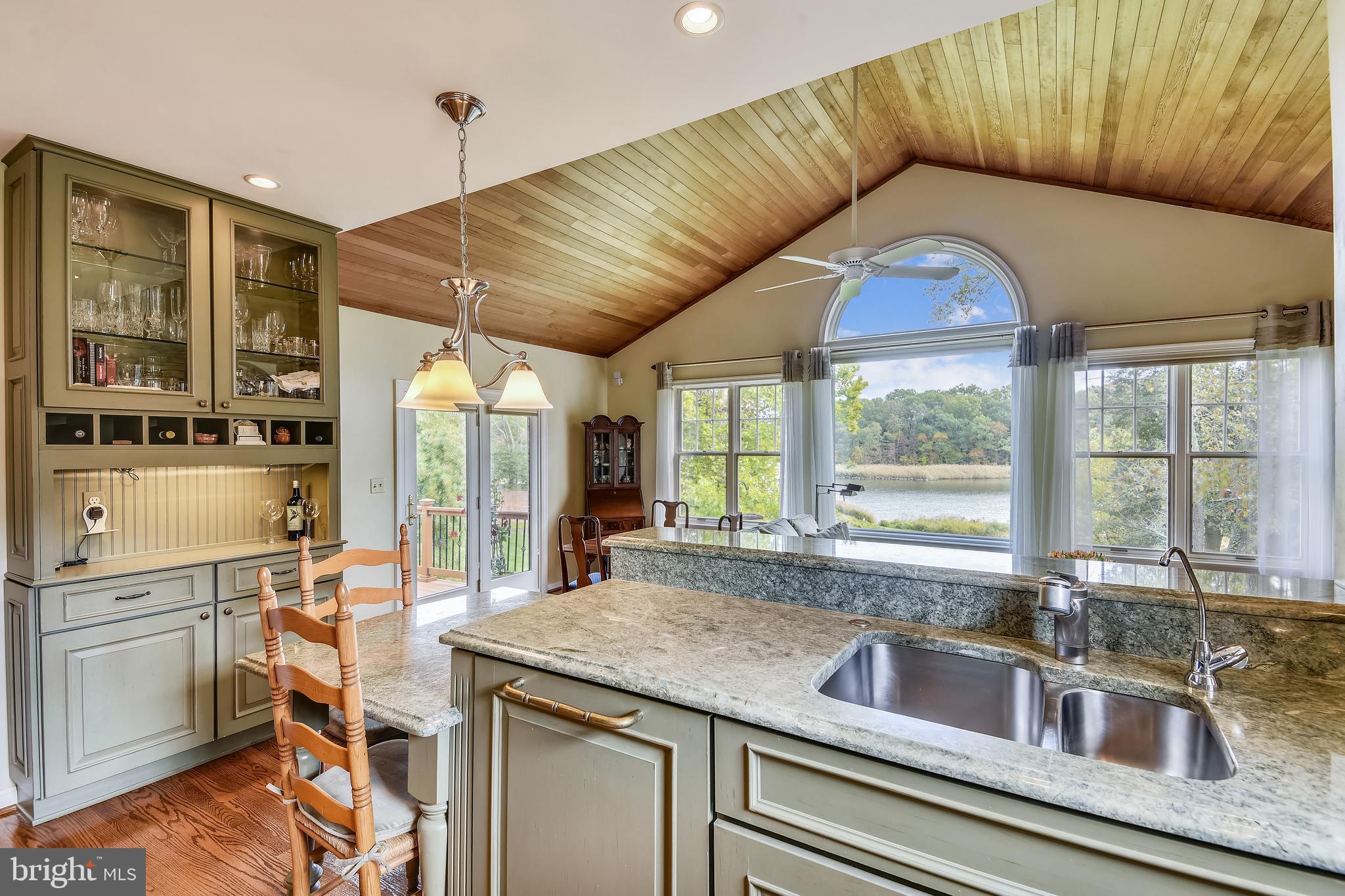 970 South River Landing Road Edgewater, MD 21037 - Photo 43 of 44 a kitchen with a sink and a large window