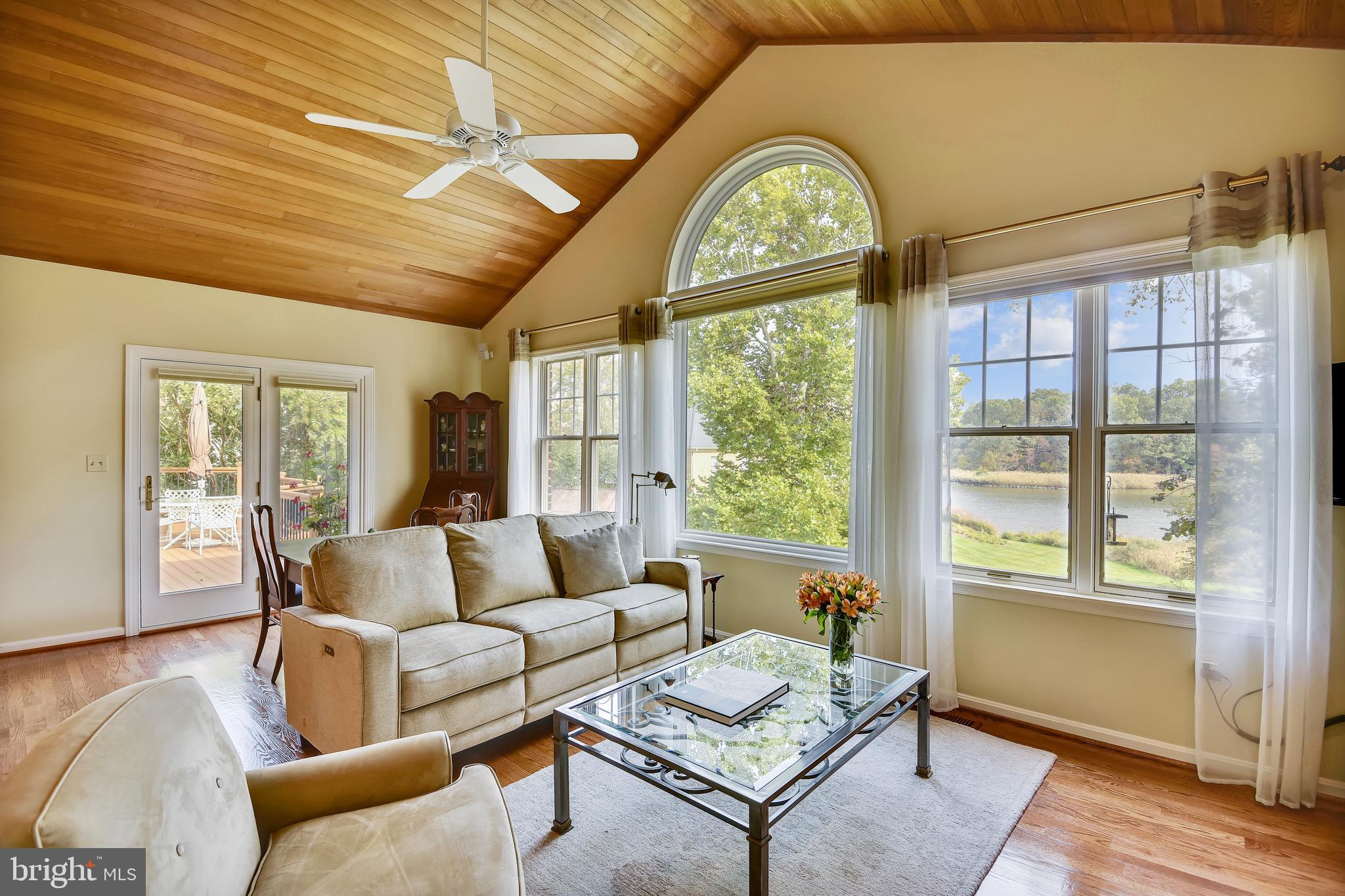 970 South River Landing Road Edgewater, MD 21037 - Photo 17 of 44 a living room with furniture and a large window