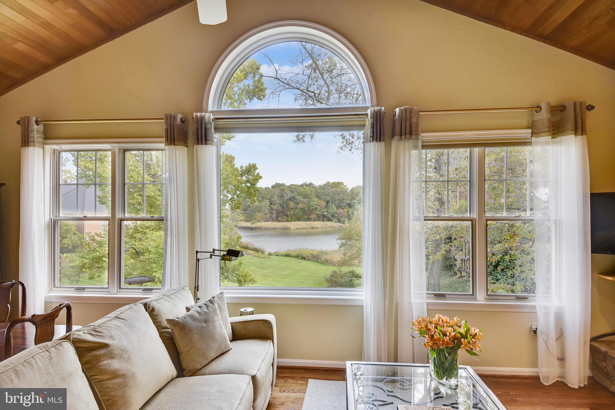 970 South River Landing Road Edgewater, MD 21037 - Photo 18 of 44 a view of a large window with a dining table and chairs