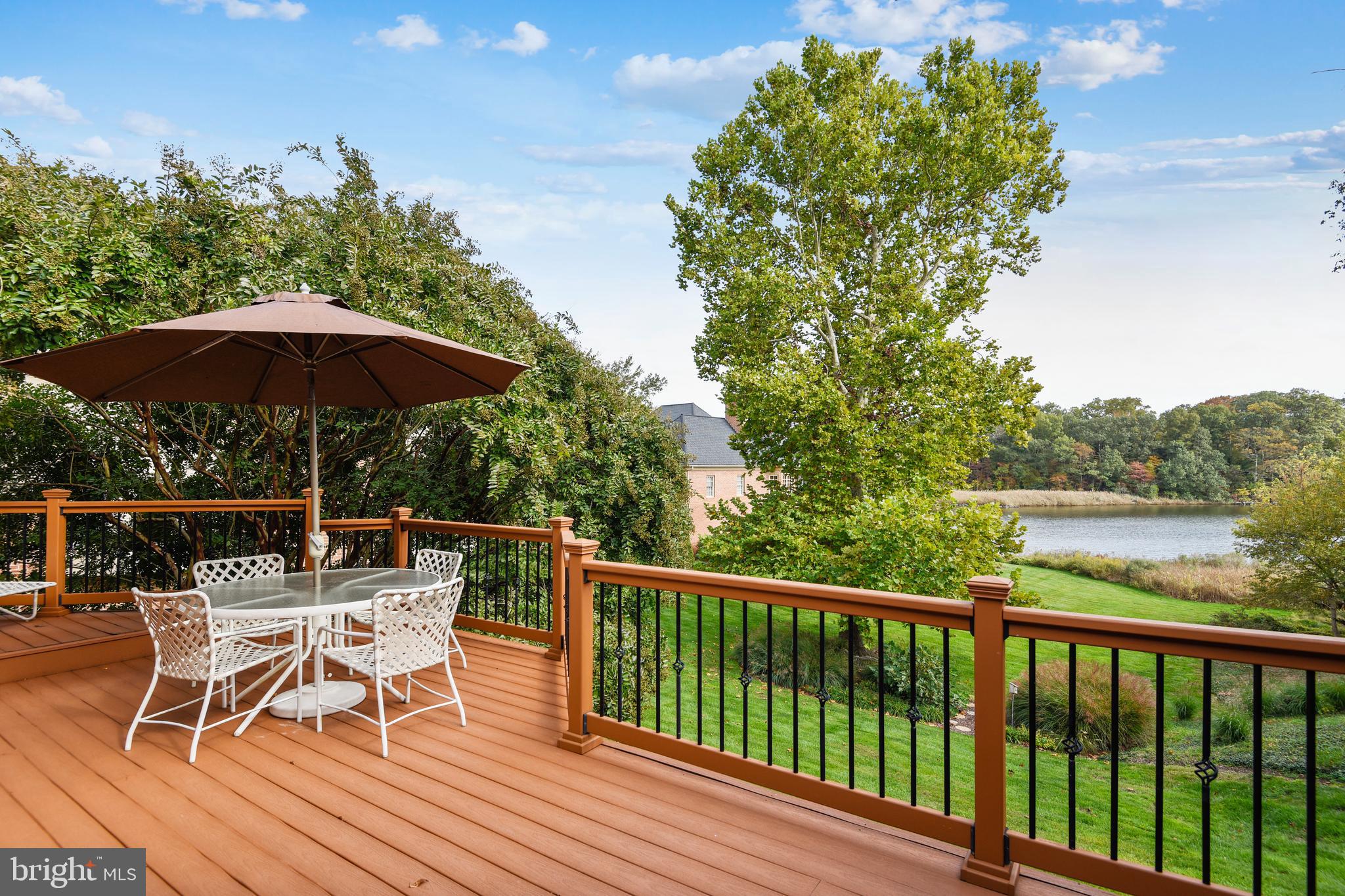 970 South River Landing Road Edgewater, MD 21037 - Photo 21 of 44 a view of chair and table with umbrella