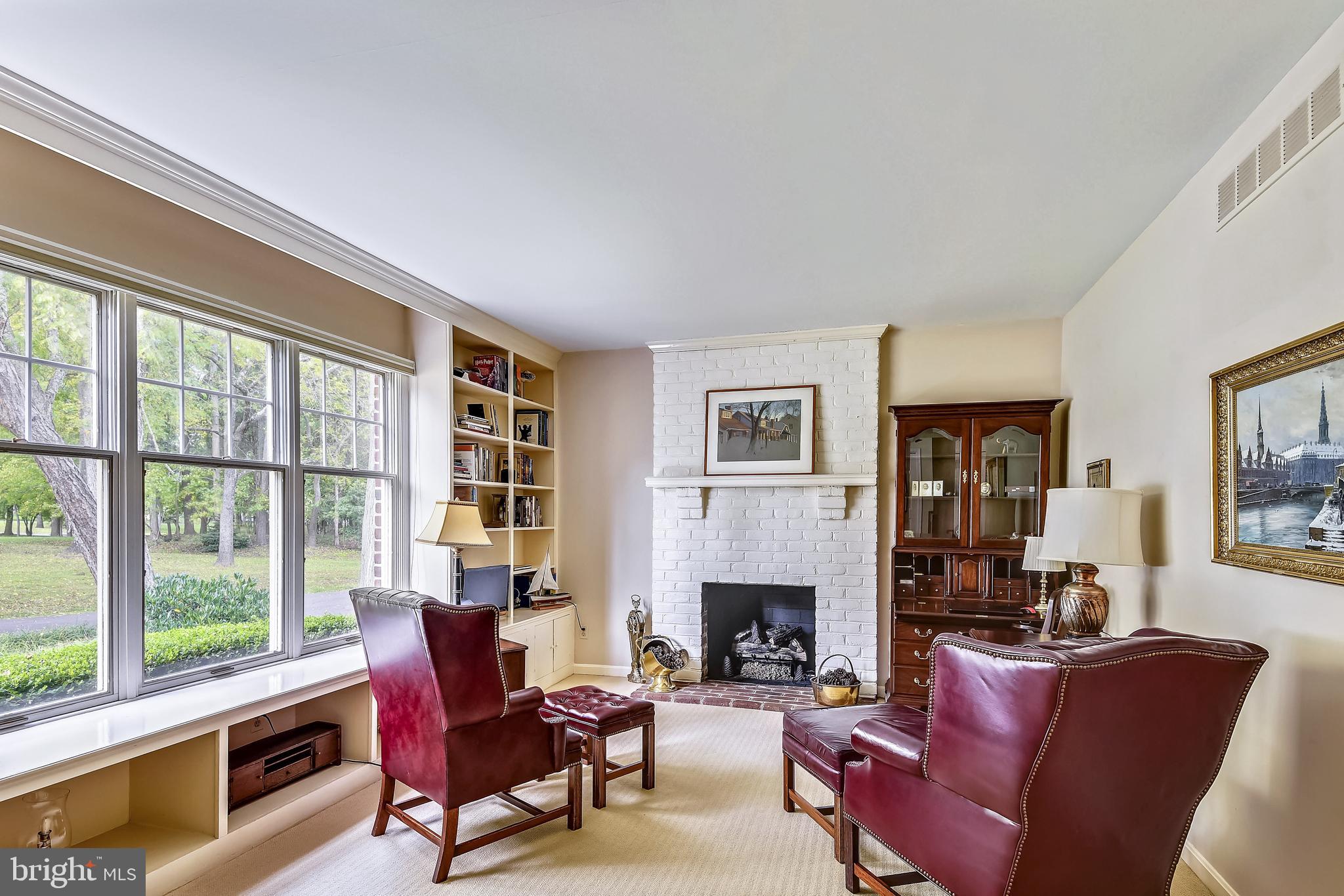 970 South River Landing Road Edgewater, MD 21037 - Photo 22 of 44 a living room with furniture and a fireplace