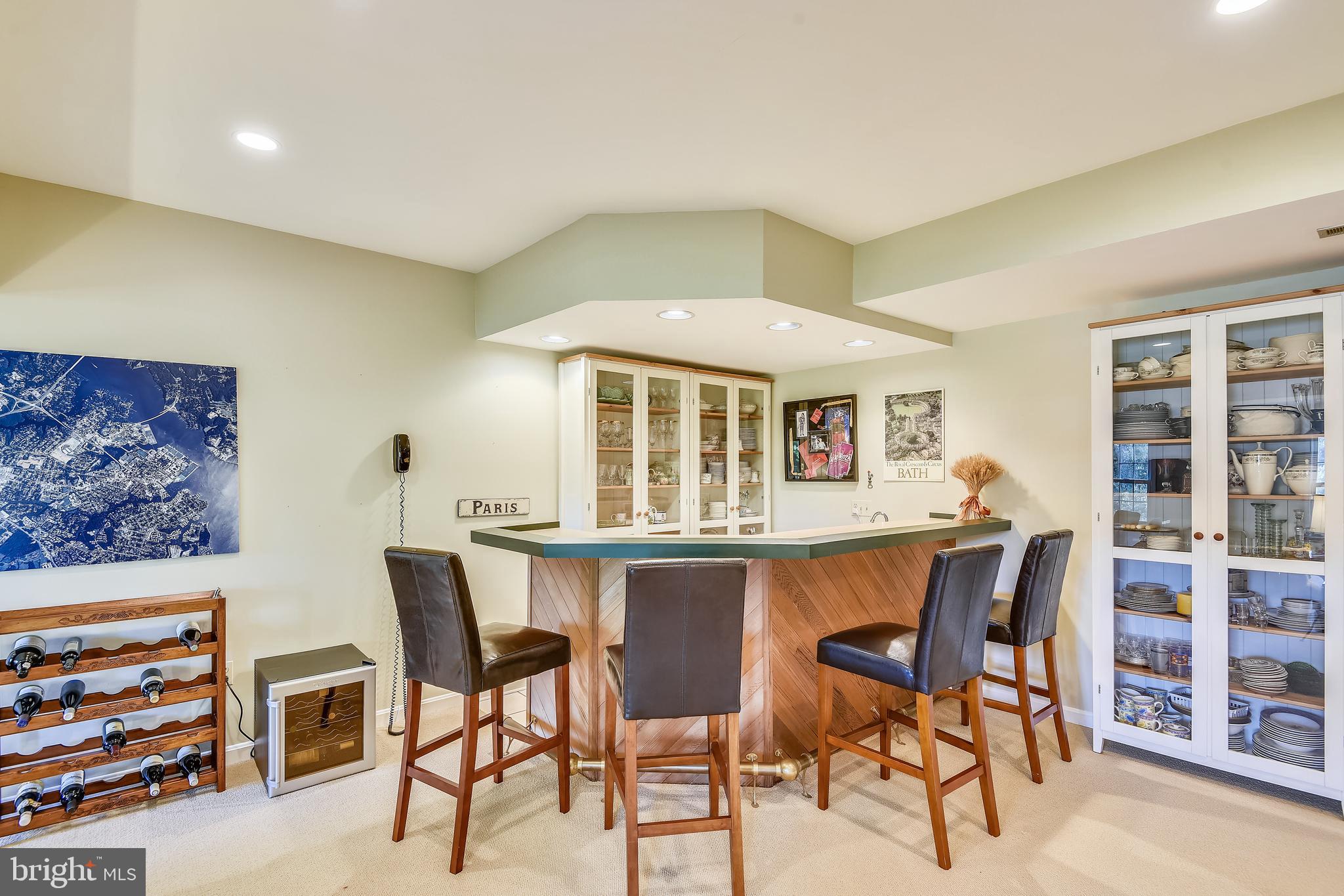 970 South River Landing Road Edgewater, MD 21037 - Photo 27 of 44 a dining room with a table and chairs