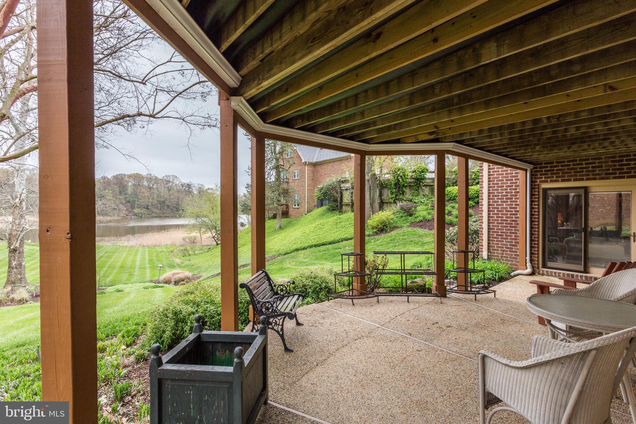970 South River Landing Road Edgewater, MD 21037 - Photo 31 of 44 a view of a porch with chairs and floor