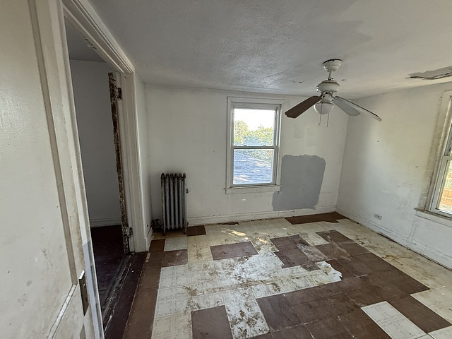 7711 South Champlain Avenue Chicago, IL 60619 - Photo 11 of 19 a view of an empty room with a window
