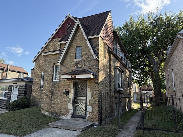 7711 South Champlain Avenue Chicago, IL 60619 - Photo 17 of 19 a front view of a house