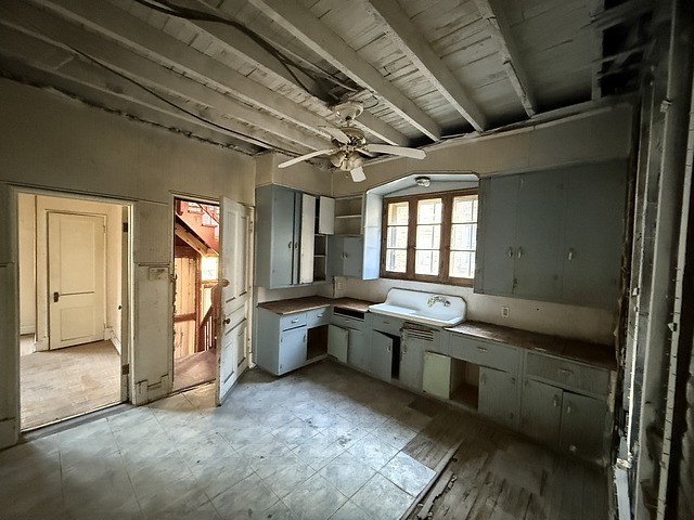 7711 South Champlain Avenue Chicago, IL 60619 - Photo 5 of 19 a room with stainless steel appliances granite countertop a sink and a refrigerator